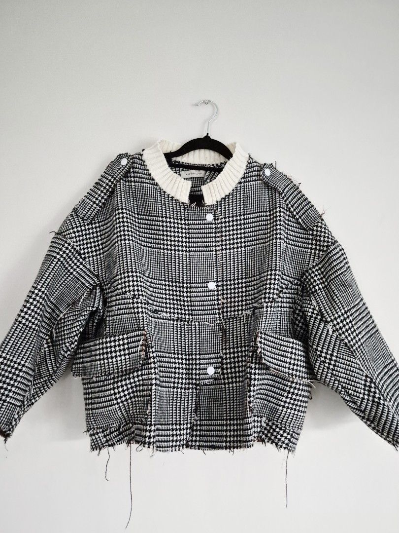 Houndstooth Heavy Knit Jacket with White Collar (Category: Coats, Jackets and Outerwear) located in Manila. Submitted by unknowncloset (Listing ID 1461215464, Image 1). Description: - Eye-catching houndstooth pattern jacket - Unique frayed edges and pocket details - Contrasting white knit collar - Classic button-up front - Perfect statement piece for any outfit.
