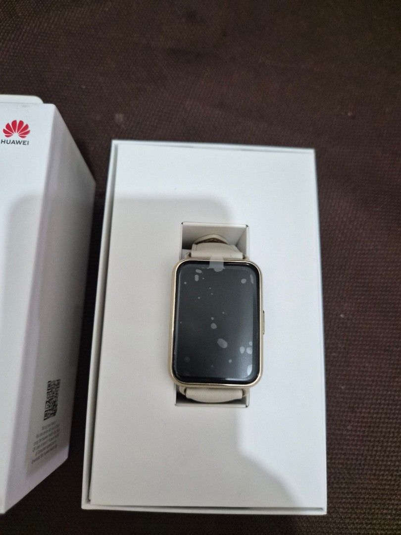 Huawei Watch Fit 2 – White/Gold | Complete Set (Category: Wearables & Smart Watches) located in Manila. Submitted by oncelovedcj (Listing ID 1461323214, Image 2). Description: Huawei Watch Fit 2 with a clean white and gold finish. Barely used and well-maintained. Screen still has its protective film. ✨ Condition: Like new – barely used, well-kept ⌚ Model: Huawei Watch Fit 2 🎨 Color: White / Gold 📦 Includes: Original box, charging cable and manu