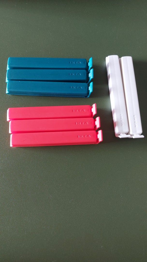IKEA Bag Clips - White, Teal, and Red (Category: Storage Boxes & Baskets) located in Taguig. Submitted by sdavid1988 (Listing ID 1461186529, Image 1). Description: - Set of 8 IKEA bag clips - Includes 2 white, 3 teal, and 3 red clips - Perfect for keeping snacks fresh - Helps seal bags tightly - Easy to use and convenient for your kitchen.