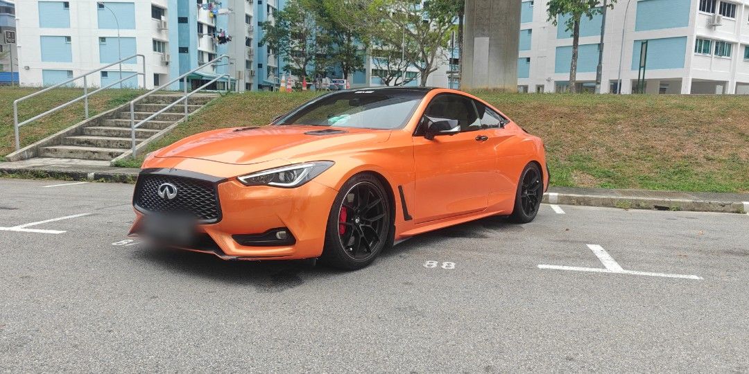 Infiniti Q60 2.0T (A) (Category: Used Cars) located in Singapore. Submitted by buys4fun (Listing ID 1459757243, Image 1). Description: Less than 10 cars in Singapore. Wear and tear parts have been replaced. comes with: New Orange wrap (Invictus) 19 inch sports rims BCBR Coilovers front BBK AMS Open port New engine mounts (3 mths old) New Wiper reservoir (3 mths old) Road Tax until 28 Dec 2026 Reason for selling: Need a four door with 3 rear passe