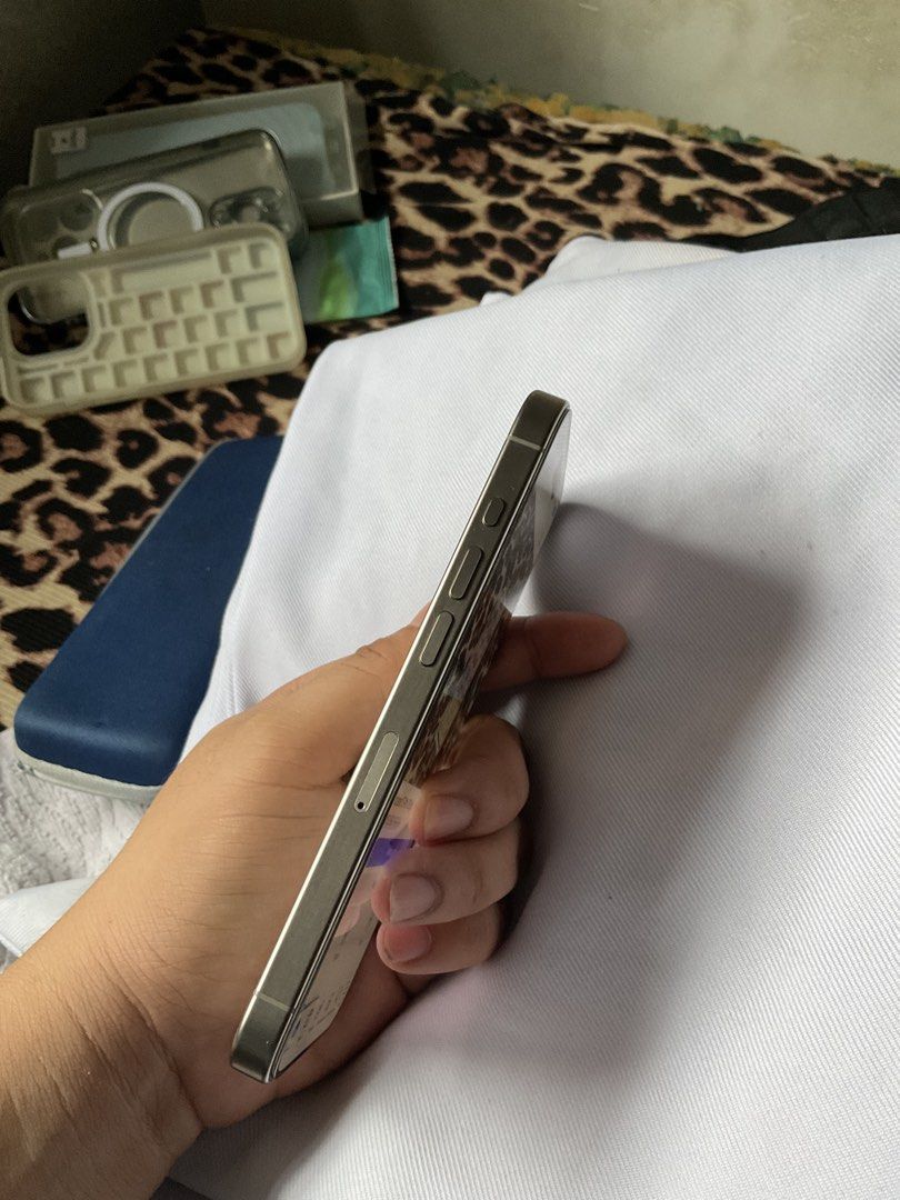 Iphone 15 pro 128gb (Category: iPhone 15 Series) located in Rizal. Submitted by fiercewhale.ec33f5 (Listing ID 1461246056, Image 3). Description: - iPhone 15 Pro - 128GB Storage - Natural Titanium Color -bh: 78 (original) maximum of 2 charge per day if talagang gamit na gamit - Available for Meetup in Marilaque Highway (Cogeo), Antipolo, Rizal - slightly nego for sure and near buyer -the only issue is may mga mini scratches na screen, aside don w