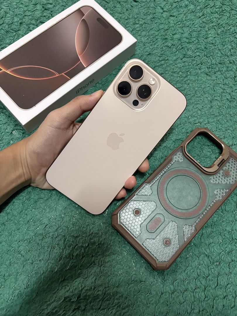 Iphone 16 Pro Max (256GB Desert Titanium) (Category: Cases & Sleeves) located in Quezon City. Submitted by iamgrei (Listing ID 1461232875, Image 3). Description: ‼️Pass to lowballers‼️ iPhone 16 pro max, 256gb storage 95 battery health, Openline honest flaw: may dark spot sa 0.5 and macro mode , no other issue. Comes with unit, tempered glass, case, replacement box, manuals and sim pin, and unused cord Meet up: Sm north or Munoz.