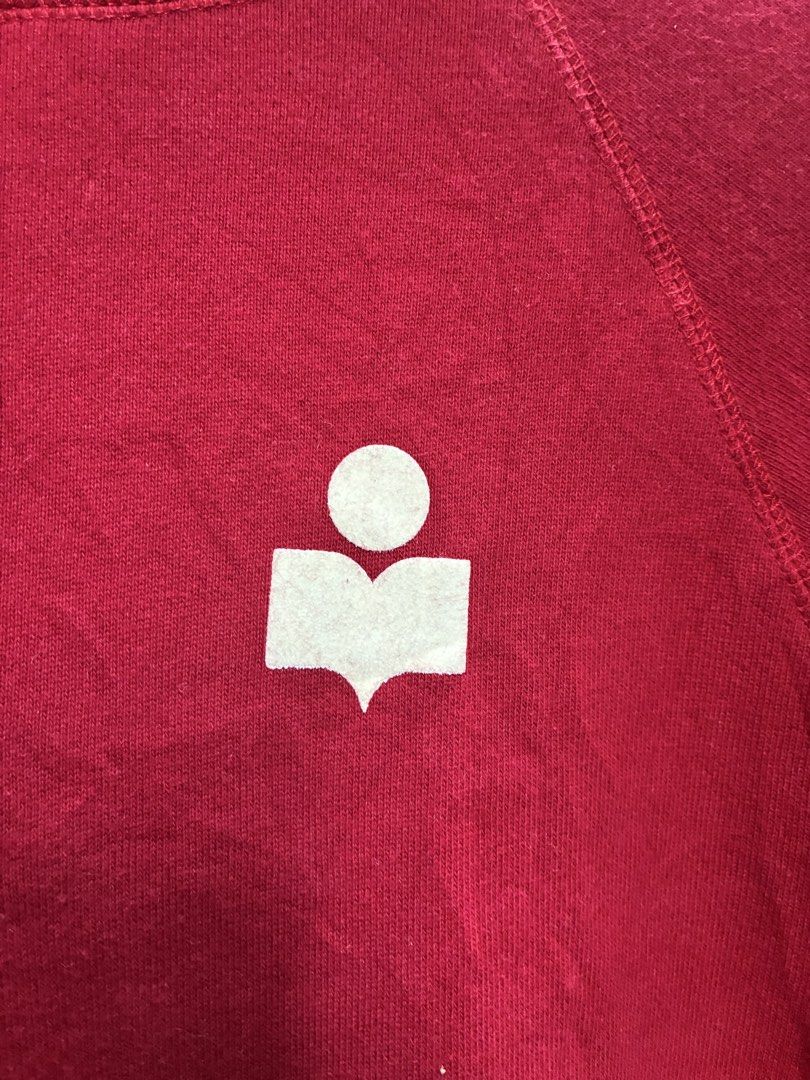 Isabel Marant Red Hoodie (Category: Coats, Jackets and Outerwear) located in Manila. Submitted by assortedgoodsv3 (Listing ID 1461307511, Image 3). Description: - Authentic Isabel Marant red hoodie - Features iconic logo on the chest - Crafted from a comfortable cotton blend - Stylish raglan sleeves - Convenient kangaroo pocket - Ideal for everyday casual wear.