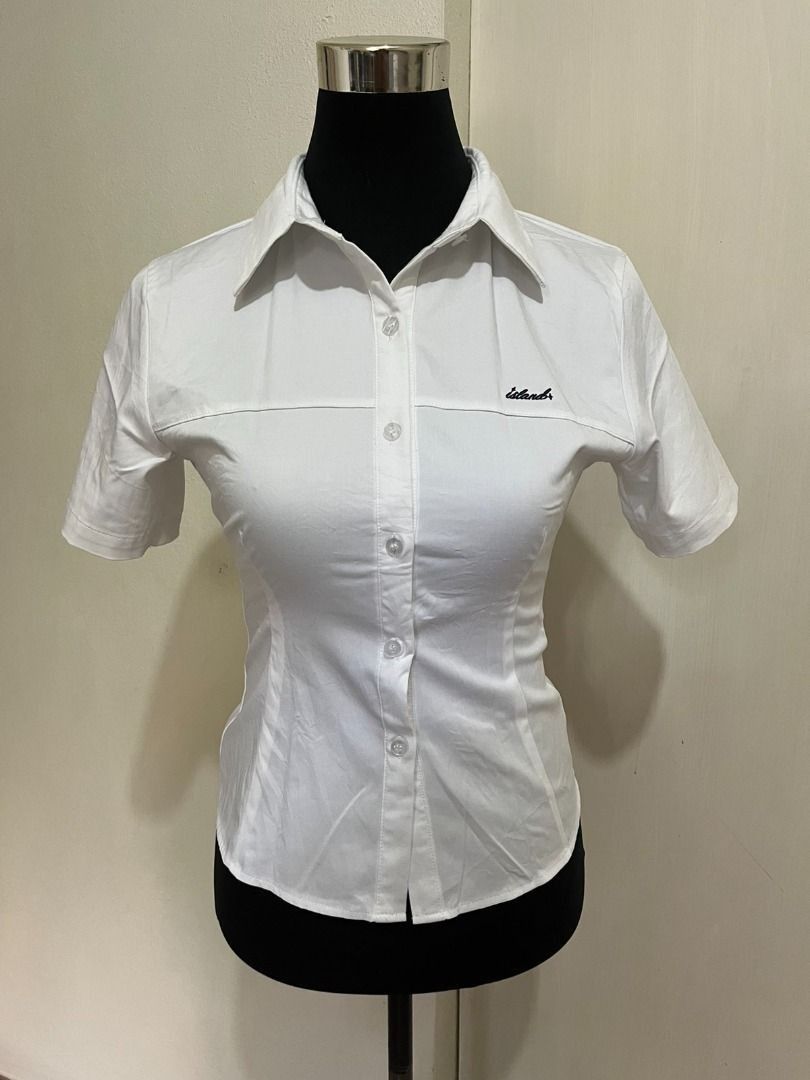Islands Souvenirs White Short Sleeve Button-Down Top (Category: Blouses) located in Mabalacat. Submitted by keb-a (Listing ID 1461153613, Image 2). Description: 🍒 — small — b: 32~34" — w: 24~26" — l: 21” 🍒 — crisp white — high-quality cotton blend — short sleeves, classic collar, and button-down front. — small "Islands" script embroidery on the left chest. 🍒 — rfs: decluttering — mop: gcash — mod: j&t ଘ(੭*ˊᵕˋ)੭* DM me for inquiries!.