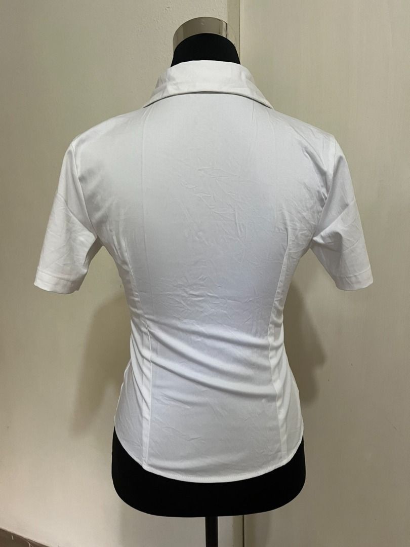 Islands Souvenirs White Short Sleeve Button-Down Top (Category: Blouses) located in Mabalacat. Submitted by keb-a (Listing ID 1461153613, Image 3). Description: 🍒 — small — b: 32~34" — w: 24~26" — l: 21” 🍒 — crisp white — high-quality cotton blend — short sleeves, classic collar, and button-down front. — small "Islands" script embroidery on the left chest. 🍒 — rfs: decluttering — mop: gcash — mod: j&t ଘ(੭*ˊᵕˋ)੭* DM me for inquiries!.