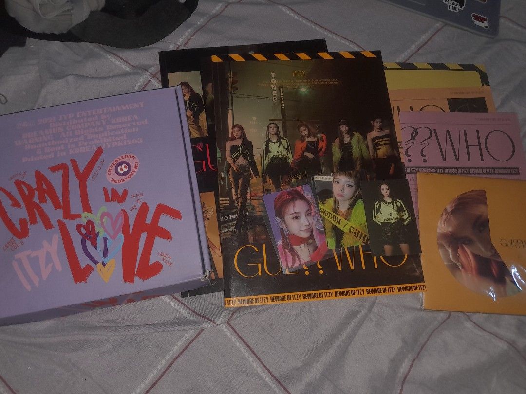 ITZY ALBUM BUNDLE (Category: CDs & DVDs) located in Manila. Submitted by xzzktrn (Listing ID 1461277569, Image 1). Description: CRAZY IN LOVE - Complete Inclusions (unsealed) - Package box + box tray - Photobook - CD - Lyrics paper - 2 photocards - 1 polaroid - POB (special card set) - Sticker Pack - Standee - Mini Poster 💿 ITZY GUESS WHO - 2 Albums (unsealed) - 2 Photobook - 1 Poster - 2 lyrics paper - Postcard set (POB) - Hidden card - 2 Photo
