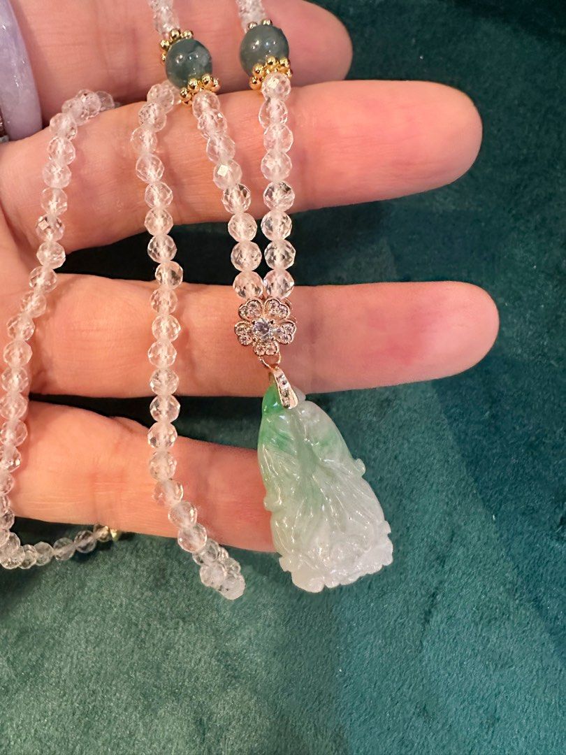 Jadeite and Crystal Beaded Necklace (Category: Necklaces) located in San Juan City. Submitted by fabbagger62976 (Listing ID 1461254678, Image 2). Description: - Beautiful necklace with a carved jadeite pendant. Type a - Features clear crystal beads and small green accent stones. - Gold-tone clasp and detailing. - Approximately 18 inches in length. - Unique piece, perfect for layering or solo wear..