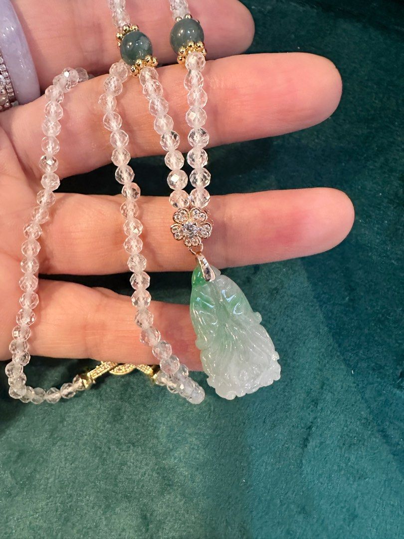 Jadeite and Crystal Beaded Necklace (Category: Necklaces) located in San Juan City. Submitted by fabbagger62976 (Listing ID 1461254678, Image 1). Description: - Beautiful necklace with a carved jadeite pendant. Type a - Features clear crystal beads and small green accent stones. - Gold-tone clasp and detailing. - Approximately 18 inches in length. - Unique piece, perfect for layering or solo wear..