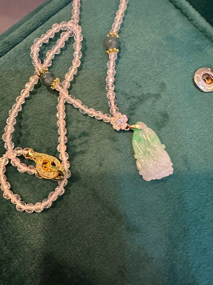 Jadeite and Crystal Beaded Necklace (Category: Necklaces) located in San Juan City. Submitted by fabbagger62976 (Listing ID 1461254678, Image 3). Description: - Beautiful necklace with a carved jadeite pendant. Type a - Features clear crystal beads and small green accent stones. - Gold-tone clasp and detailing. - Approximately 18 inches in length. - Unique piece, perfect for layering or solo wear..