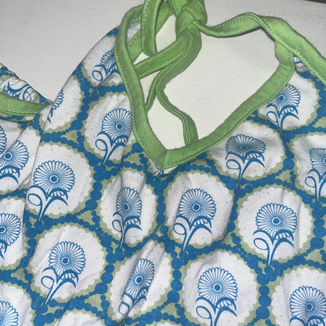 Jellymallow Blue Floral Tank Top (Category: Sleeveless) located in Makati City. Submitted by midnightmelhem (Listing ID 1461146037, Image 1). Description: - Cute blue floral print tank top - Green trim and tie straps at the back - Brand: Jellymallow Kids - Perfect for casual wear or layering - Soft and comfortable fabric.