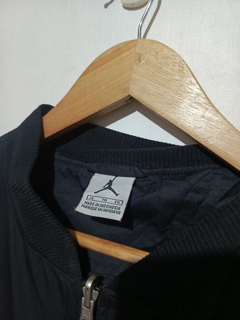 JORDAN BOMBER JACKET (Category: Coats, Jackets and Outerwear) located in Baguio. Submitted by 074thriftmania (Listing ID 1461277693, Image 3). Description: - Black Jordan bomber jacket - Features iconic Jumpman logo on chest - Zipper closure with convenient pockets - Ribbed collar and cuffs for a snug fit - Made in Indonesia - Size XL.