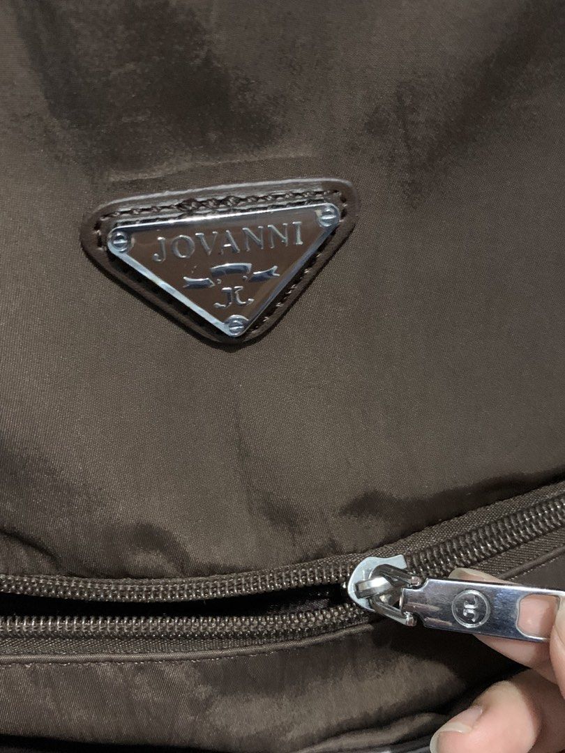JOVANNI Brown Backpack (Category: Backpacks) located in Cavite. Submitted by zizi_z1 (Listing ID 1461292123, Image 3). Description: ₱ 1.2k (orig price 3k+) - like new, used twice only kakabili lang this month - kasya 15.6 inch laptop - maraming compartments - choco brown/dark brown color - orig plastic & ecobag included rfs: too big pala for me MOP: gcash / bank / cash MOD: lalamove / pick-up / J&T.