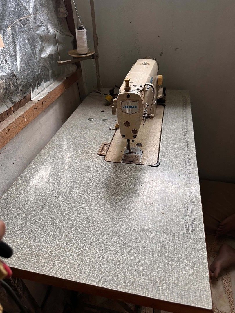 JUKI DDL-8500 Industrial Sewing Machine with Table (Category: Other Home Appliances) located in Manila. Submitted by monya111 (Listing ID 1461153694, Image 3). Description: - JUKI DDL-8500 Industrial Sewing Machine - Comes with a sturdy table - Includes foot pedal for easy operation - Pre-loaded with a spool of white thread - Perfect for all your sewing projects - Ready to go!.