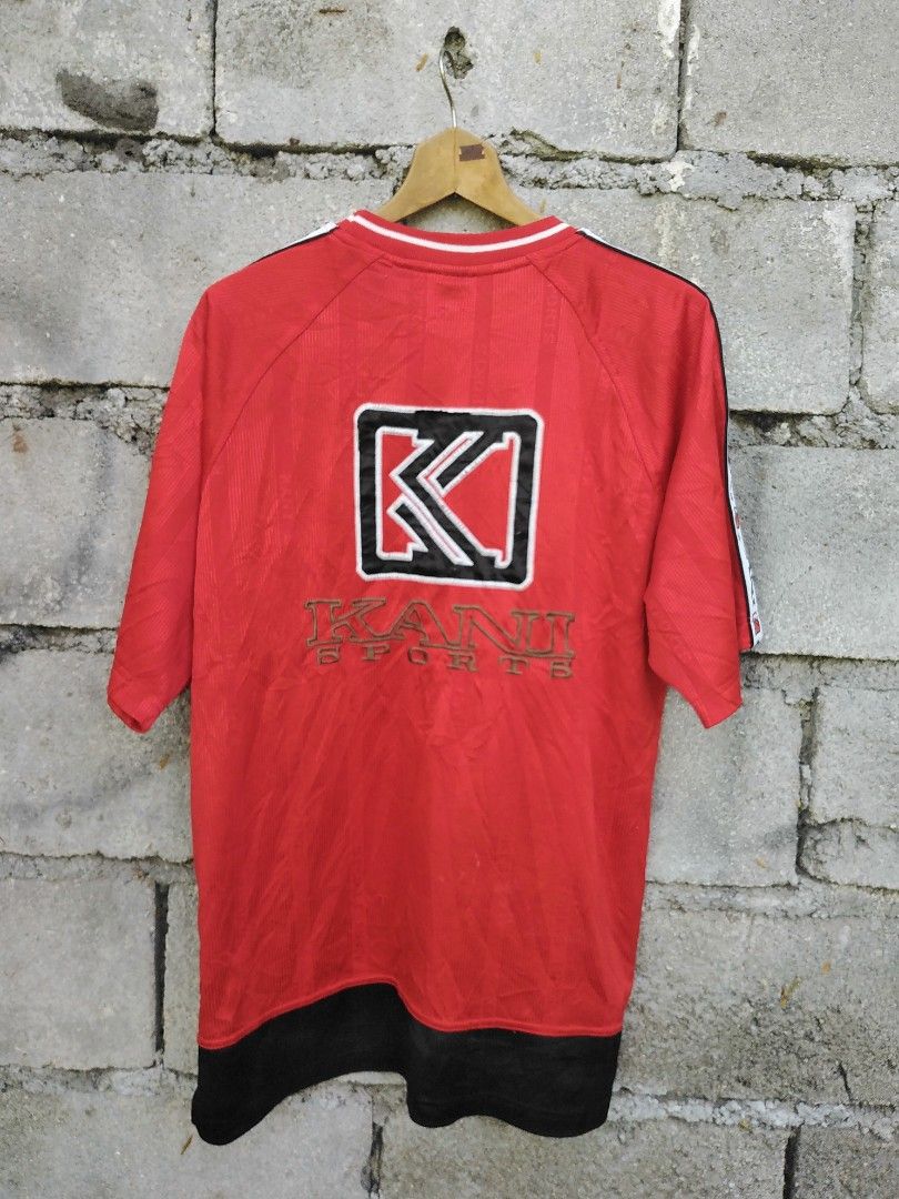 Karl kani (Category: Tshirts & Polo Shirts ) located in General Santos City (Dadiangas). Submitted by evolveorrepeat (Listing ID 1460971007, Image 2). Description: Vtg karl kani sport hop jersey tape slevee Size large on tag Pit to pit 23 L" 31.5 In very good used condition Dm to purchase! Color may very due to lighting.