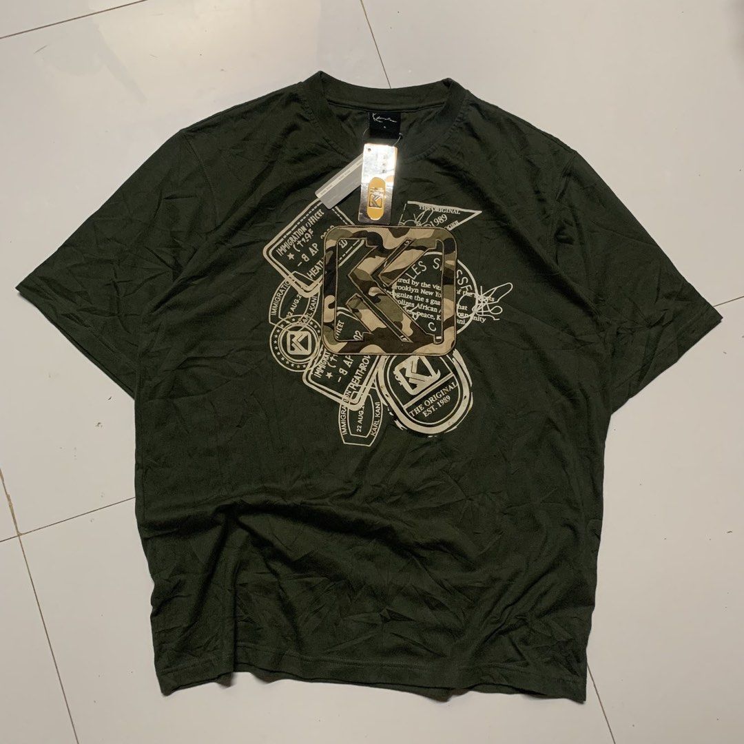 KARL KANI BIG LOGO (Category: Tshirts & Polo Shirts ) located in Andop. Submitted by junjun_watanabe (Listing ID 1461266021, Image 1). Description: size M on tag but fit L - XL color rate: 10/10 condition: brand new issue: yellow stain.