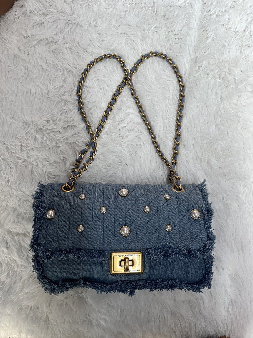 KARL LAGERFELD (Category: Shoulder Bags) located in Cotabato. Submitted by big_cash (Listing ID 1461117723, Image 1). Description: NWT Karl Lagerfeld Agyness Blue Denim Shoulder Bag Faux Pearl Studs Chain Straps.