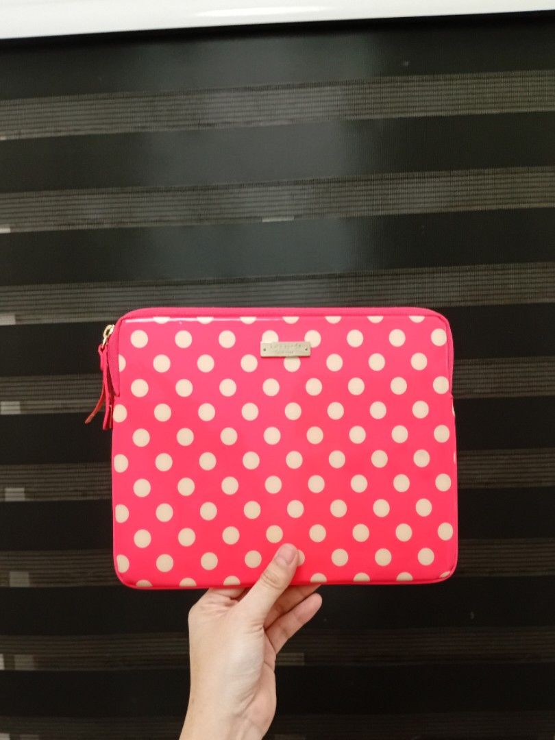 Kate Spade New York Tablet Sleeve (Category: Laptop Bags & Sleeves) located in Manila. Submitted by eriiicaspage (Listing ID 1461266289, Image 2). Description: Authentic Kate Spade tablet Sleeve Neon Pink Cute pink Kate Spade laptop sleeve - Classic polka dot design - Secure zip closure with tassel detail - Soft beige interior lining - Ideal for protecting laptops or tablets Min Sign of Used Good Condition 9/10 .