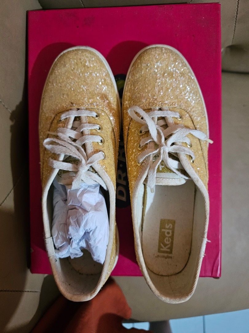 Keds Glitter Sneakers Gold (Category: Sneakers) located in Manila. Submitted by sinnig (Listing ID 1461122707, Image 1). Description: - Gold glitter Keds sneakers - Lace-up style - Soles show some wear - Glitter remains very sparkly - Adds shine to any outfit - Comfortable for everyday wear.