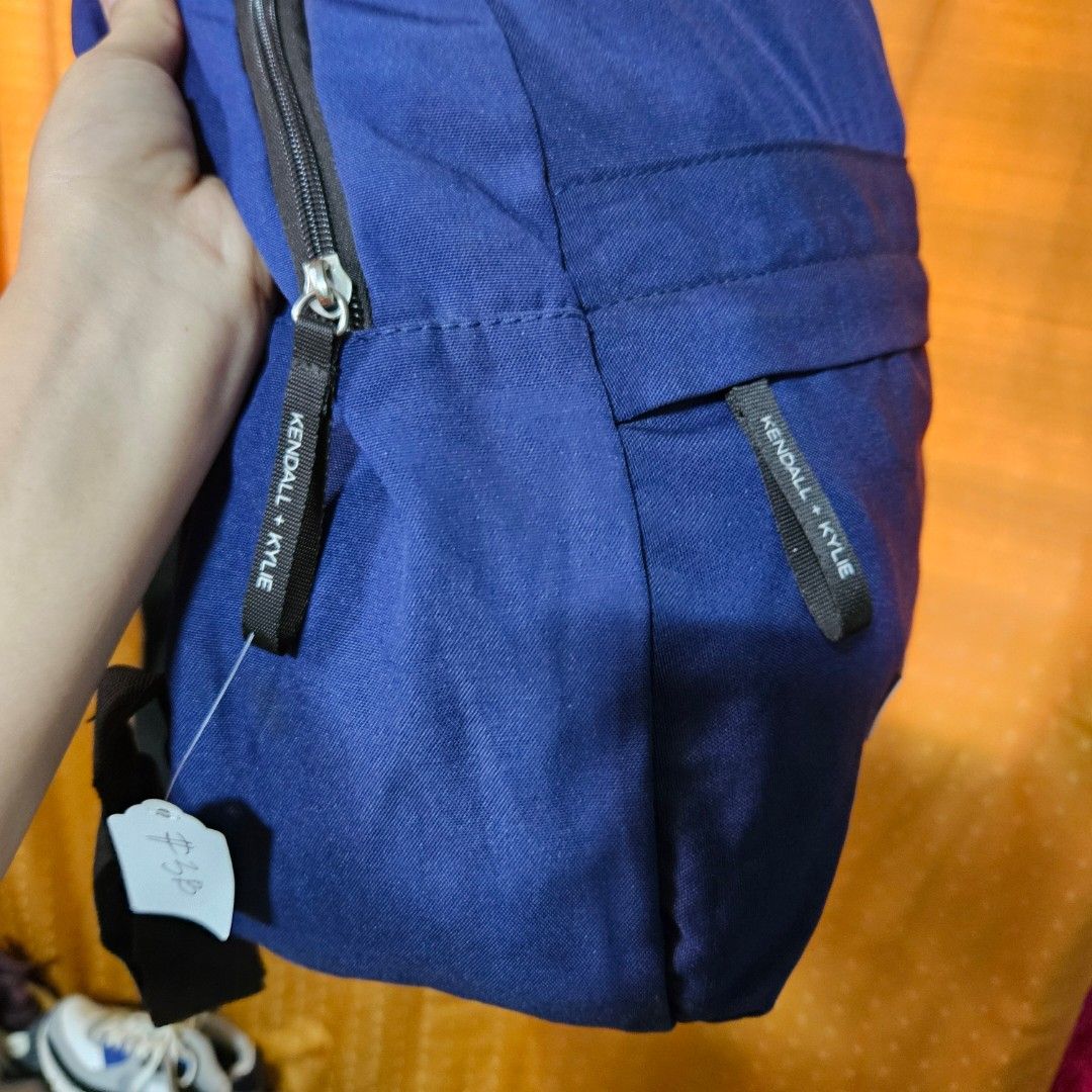KENDALL +KYLIE navy blue full-size backpack (Category: Backpacks) located in Digos. Submitted by marianfinds (Listing ID 1461180461, Image 3). Description: Authentic/preloved item. Actual photos posted. Please check all photos and details carefully before purchasing. Minor signs of use may be present. 📌Please manage your expectations this is not brandnew Walk in buyers are always welcome!✨️ 📍Location: Lim extension,Digos City Davao Del Sur,besi