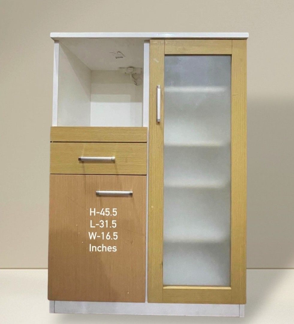 Kitchen Counter Buffet Sideboard Cabinet Coffee Nook (Category: Shelves, Cabinets & Racks) located in Quezon City. Submitted by dannikkishoppe2 (Listing ID 1461266973, Image 1). Description: Kitchen Counter Buffet Sideboard Cabinet Coffee Nook ‼️₱6800‼️ ✔️ Sturdy and durable ✔️ With adjustable shelves ✔️ With convenient pull-out tray ✔️ With built-in outlet for microwave, rice cooker, or other appliances Perfect for organizing your kitchen essent