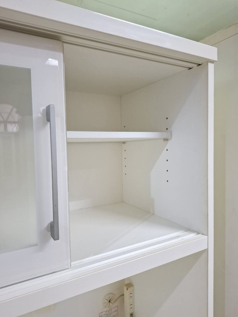 Kitchen Cupboard Hutch Cabinet (Category: Shelves, Cabinets & Racks) located in Quezon City. Submitted by dannikkishoppe2 (Listing ID 1461156142, Image 3). Description: Kitchen Cupboard Hutch Cabinet ‼️₱15000‼️ *glass, solid wood, compressed wood *adjustable shelves *with built-in outlet for microwave, rice cooker, or other appliances Please manage your expectations as there might be minimal flaws. Color may vary due to lighting, it may appear da