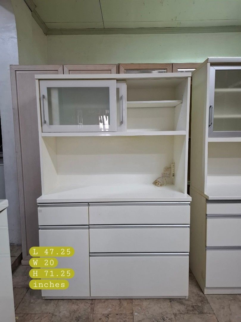 Kitchen Cupboard Hutch Cabinet (Category: Shelves, Cabinets & Racks) located in Quezon City. Submitted by dannikkishoppe2 (Listing ID 1461156142, Image 2). Description: Kitchen Cupboard Hutch Cabinet ‼️₱15000‼️ *glass, solid wood, compressed wood *adjustable shelves *with built-in outlet for microwave, rice cooker, or other appliances Please manage your expectations as there might be minimal flaws. Color may vary due to lighting, it may appear da