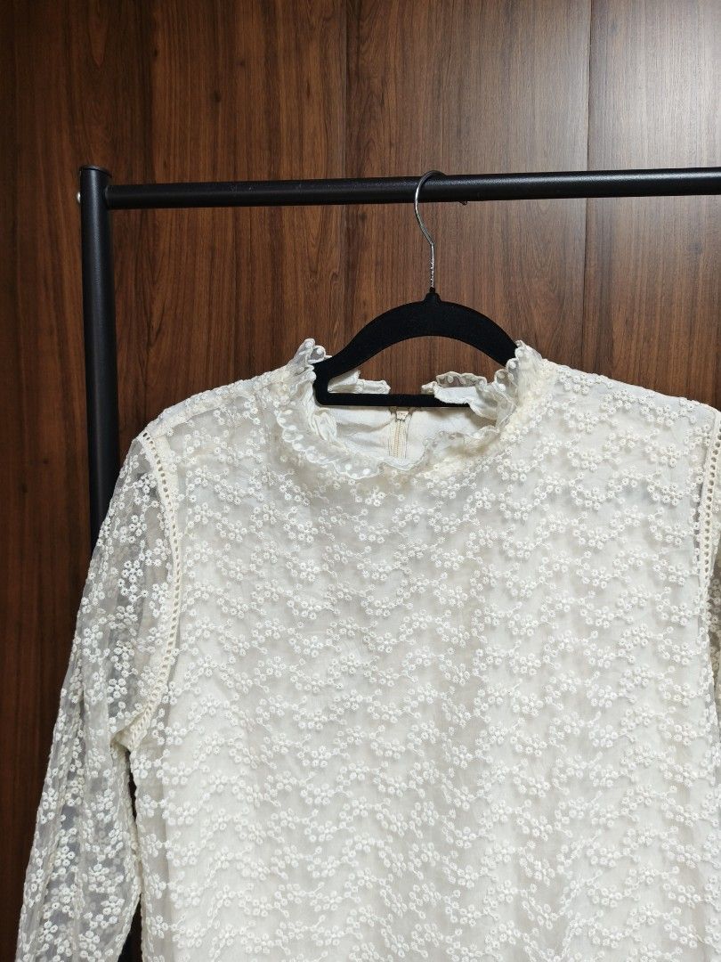 Lace Embroid midi dress (Category: Dresses) located in Baguio. Submitted by PreiLoveMaria (Listing ID 1461219919, Image 3). Description: Elegant cream/off-white lace midi dress featuring an all-over delicate floral embroidered pattern, long sheer sleeves, a chic high ruffle neckline, and a playful tiered drop-waist hem with a scalloped edge. It is fully lined through the body and has a concealed back zipper closure for a clean, polished finish. ​