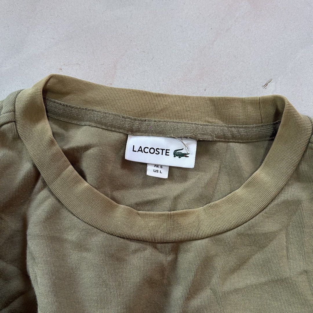 Lacoste Crewneck 🔥 (Category: Coats, Jackets and Outerwear) located in Jinoba-an. Submitted by eegiboy (Listing ID 1461152302, Image 2). Description: Wts: Lacoste crewneck 🔥 Size: 5 Large Dimes: 24/28 Vgood condition 🥰 Issue: Discoloration & Stain 😉 550only plussf Dm me if interested 📩 Thankyou🙏😇.