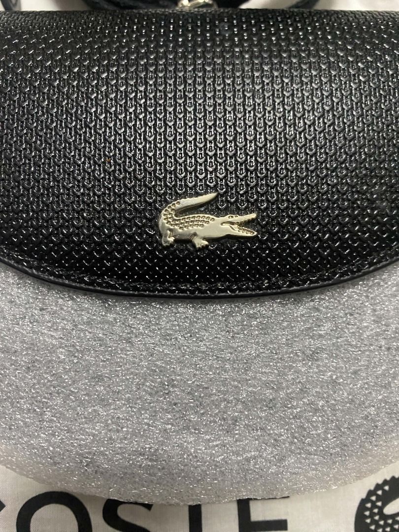 Lacoste half-moon bag (Category: Luxury Bags & Wallets) located in Angeles City. Submitted by joelpaglingayen (Listing ID 1461232570, Image 2). Description: Lacoste half-moon bag PRELOVED NOT UKAY AUTHENTIC L/ORIGINAL WITH PAPER BAG AND DUST BAG.