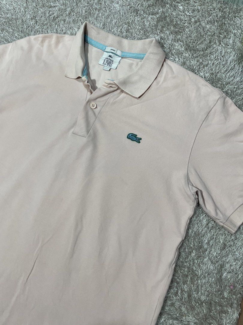 lacoste live unisex (Category: Tshirts & Polo Shirts ) located in Las Pinas. Submitted by moncaz2461827 (Listing ID 1461256205, Image 3). Description: L@€0ste LIVE unisex POLOSHIRT Medium to large womens or medium men Dimes 21x26 Excellent condition Color rate 9.8/10 (matte light pink) No issue .