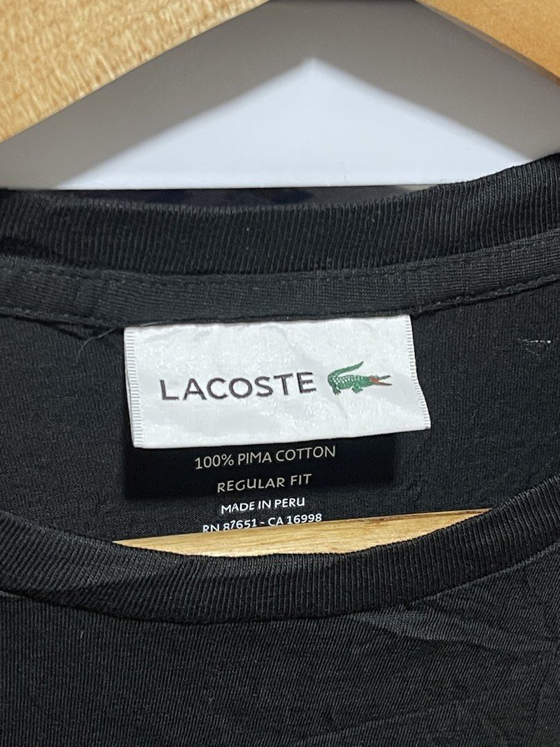 Lacoste Plain Black shirt chest logo M (Category: Shirts) located in Marikina City. Submitted by joshuaades21107 (Listing ID 1461292622, Image 3). Description: -Lacoste shirt -100% cotton -Medium fit Dimension: 21 w 26 l 10/10 color rate and condition.