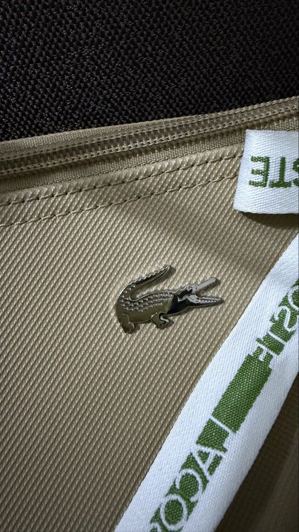 Lacoste Shoulder Bag (Category: Shoulder Bags) located in Manila. Submitted by iamcv8 (Listing ID 1461254732, Image 2). Description: Lacoste Shoulder Bag Bought in Pasabuy Ohana Mnl in IG unfortunately their page has been disabled .