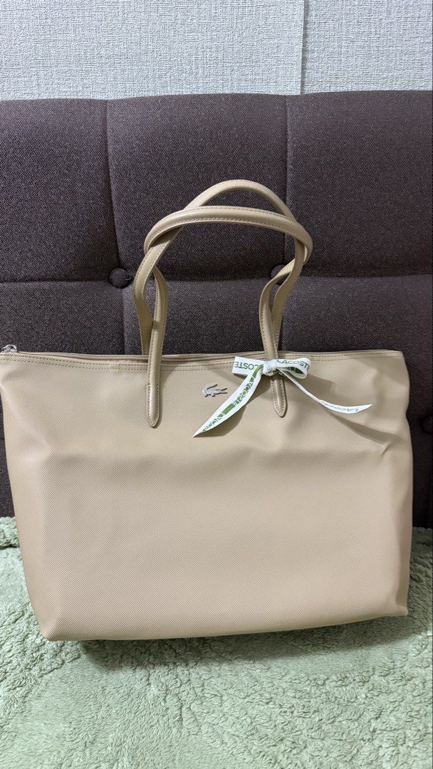Lacoste Shoulder Bag (Category: Shoulder Bags) located in Manila. Submitted by iamcv8 (Listing ID 1461254732, Image 1). Description: Lacoste Shoulder Bag Bought in Pasabuy Ohana Mnl in IG unfortunately their page has been disabled .