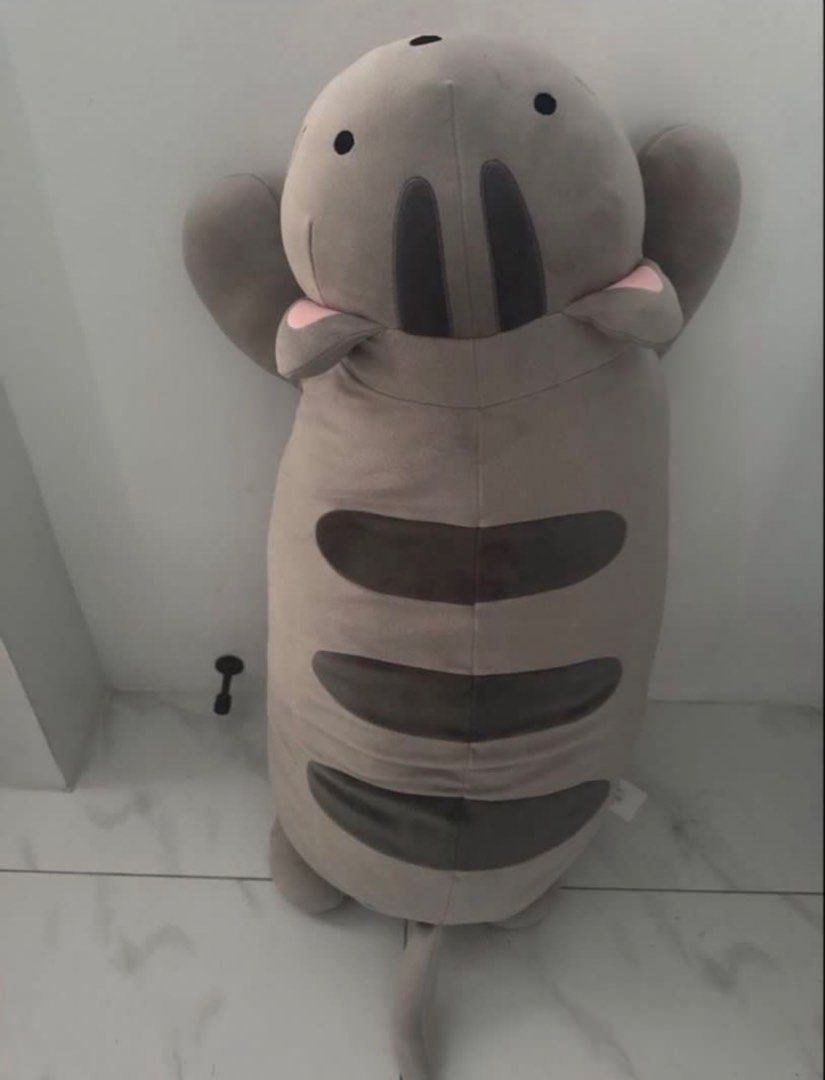 Large Grey Cat Plush Pillow Toy (Category: Plushies & Soft Toys) located in Manila. Submitted by decluterthings888 (Listing ID 1461138011, Image 2). Description: - Adorable and squishy grey cat plush - Large size, ideal for cuddling or as a decorative pillow - Soft, touchable material - Features charming stripe details - Ready to find a new loving home.
