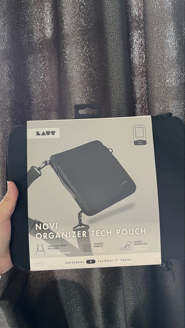 LAUT Novi Organizer Tech Pouch for 11" Tablet (Category: Belt bags, Clutches and Pouches) located in Pasig City. Submitted by thegoodfinds2 (Listing ID 1461204865, Image 1). Description: - Protect your tablet with the LAUT Novi Organizer Tech Pouch. - Made from durable nylon with a padded interior for maximum protection. - Features a divided front pocket for easy organization of essentials. - Includes a convenient carrying strap. - Designed to fi