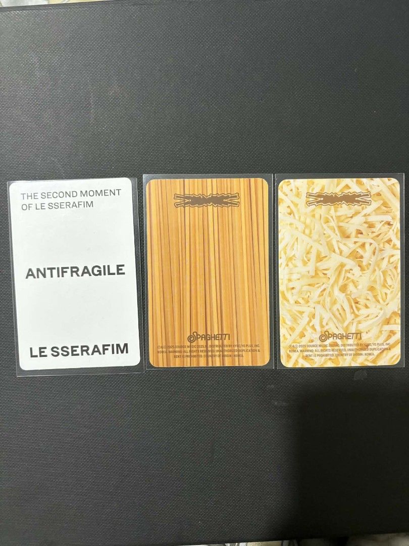 LE SSERAFIM YUNJIN PHOTOCARDS SET (SPAGHETTI, ANTIFRAGILE) (Category: K-Wave Merchandise) located in Manila. Submitted by pokinana67 (Listing ID 1461311368, Image 2). Description: - LE SSERAFIM YUNJIN Photocards - Spaghetti and Antifragile Version: - Left Card (ANTIFRAGILE Compact Ver.) - Middle Card (SPAGHETTI Vol.1 "Weird Garlic") - Right Card (SPAGHETTI Standard Photobook Ver.) - Set includes 3 photocards - Perfect for FEARNOT collections OTHE