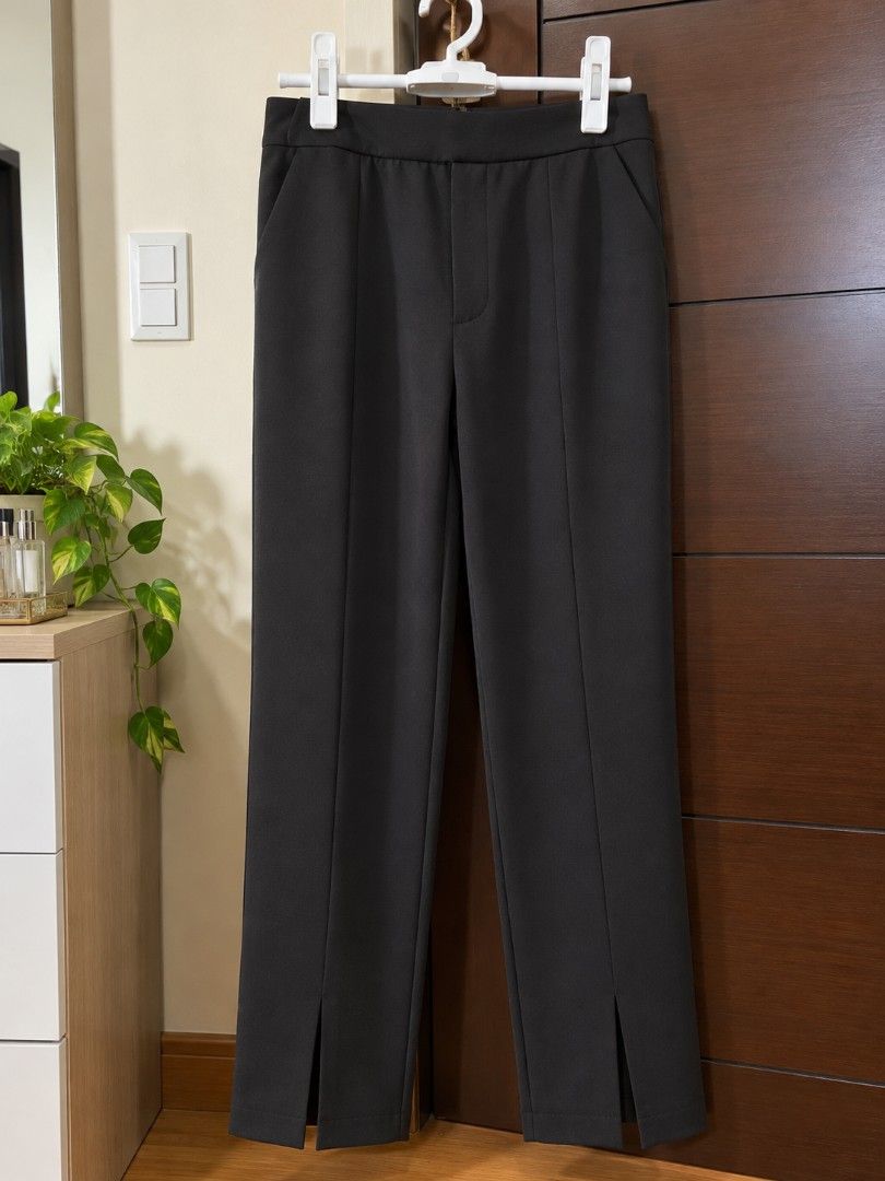 Lealea Studio Black Split Hem Trousers (Category: Other Bottoms) located in Pasig City. Submitted by mitchh.bc (Listing ID 1461214658, Image 1). Description: - Brand: Lealea Studio - sixe xl 30-31 - Color: Black - Fit: Straight leg - Details: Split hem, High waisted - Style: Versatile for work or casual wear, easy to dress up or down.