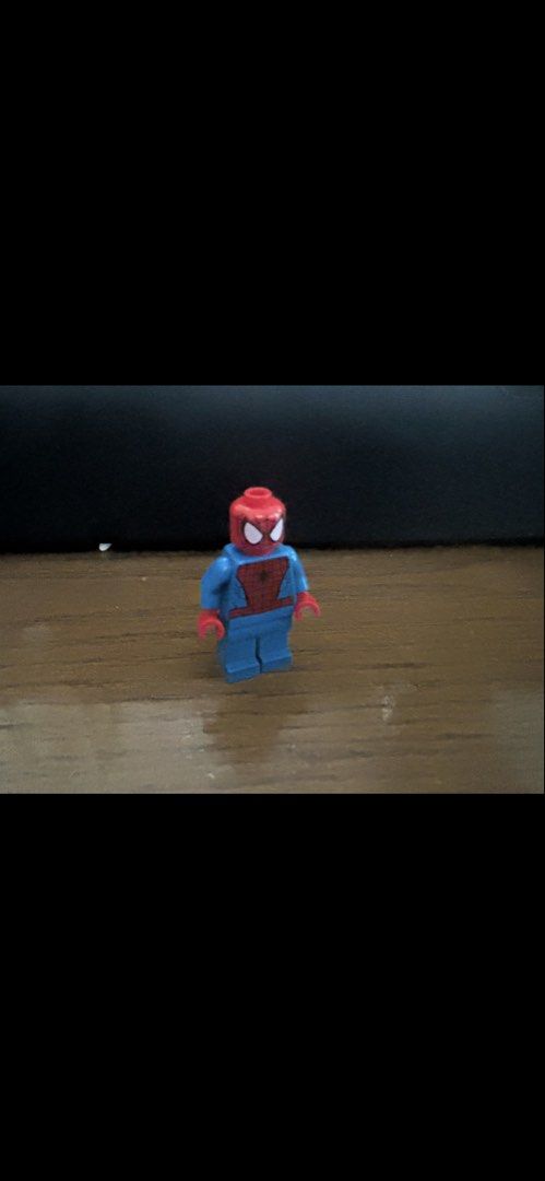 Lego Spider-Man Minifigure (Category: Lego & Building Sets) located in Makati City. Submitted by rcg98 (Listing ID 1461256980, Image 1). Description: - Authentic Lego Spider-Man minifigure - Features the iconic red and blue suit with spider emblem - Ideal for Marvel enthusiasts and Lego collectors - In good, pre-loved condition.