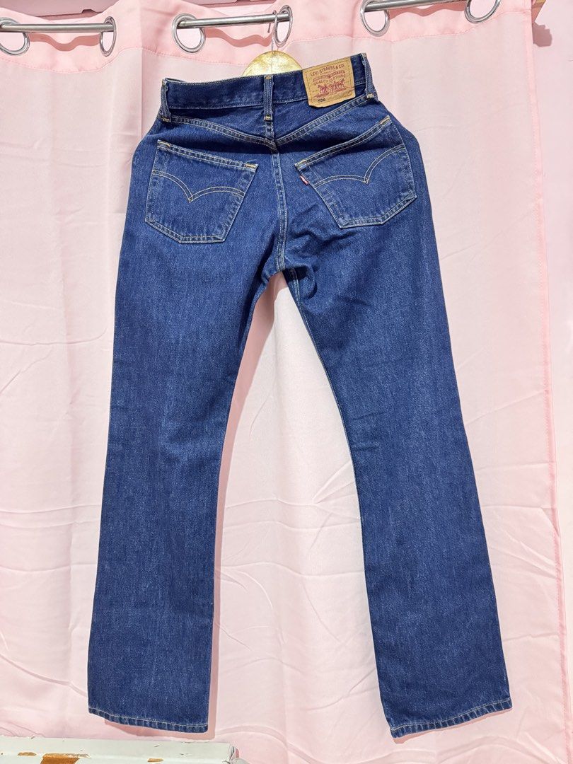 Levi's 596 Original Fit Jeans (Category: Jeans) located in Valenzuela. Submitted by declutterlangpo (Listing ID 1461136745, Image 2). Description: - Classic Levi's jeans in a dark wash denim. - Original fit with a subtle flare at the hem. - Authentic button fly closure. - Iconic Levi's red tab and arc stitching on back pockets. - A versatile staple piece for any wardrobe, perfect for dressing up or down..