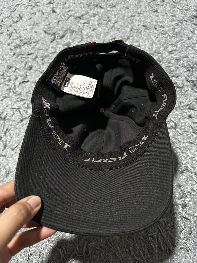 Levi's Flexfit Cap - Black or White Available (Category: Caps & Hats) located in Caloocan City. Submitted by kosem18 (Listing ID 1461243920, Image 3). Description: - Classic black Levi's cap - Embroidered Levi's logo on the front - Flexfit technology for a comfortable, snug fit - Adjustable strap at the back for customisable size - Perfect for everyday wear and versatile styling.