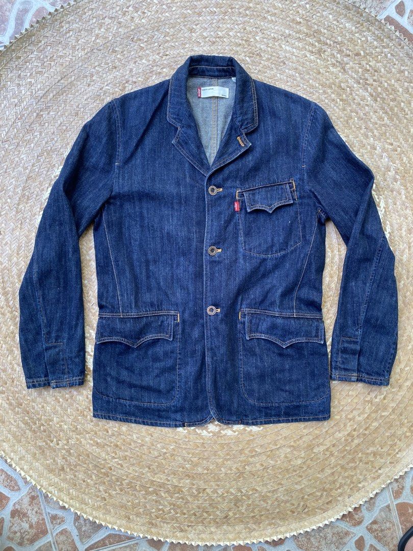 Levi’s Jacket (Category: Coats, Jackets and Outerwear) located in Legazpi City. Submitted by inviteonly (Listing ID 1461215786, Image 1). Description: — 100% cotton — 21” pit to pit on tape — 31” base or collar to hem — 17 1/2” shoulders — 25 3/4” sleeves — 4 1/2” sleeve width — stow-away arcuate shaped pocket flaps — 3-button front closure — notch lapels — functioning sleeve buttons — red tab on breast pocket — sized Medium-95 on tag — casual de