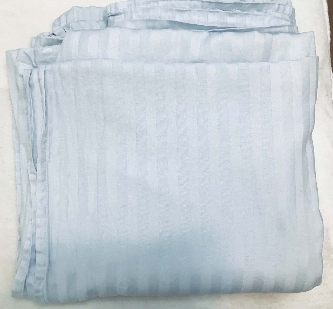 Light Blue Striped 100% Cotton Queen Flat Sheet/Blanket (Category: Bedding & Towels) located in Imus. Submitted by stop_shop7 (Listing ID 1461183548, Image 3). Description: - Light blue queen bed sheet - Made from 100% soft & breathable cotton - Features a subtle stripe pattern - Ideal for everyday use - Easy to wash and maintain - Fits standard queen size mattresses.