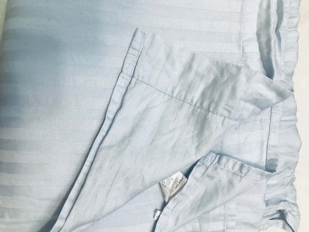 Light Blue Striped 100% Cotton Queen Flat Sheet/Blanket (Category: Bedding & Towels) located in Imus. Submitted by stop_shop7 (Listing ID 1461183548, Image 1). Description: - Light blue queen bed sheet - Made from 100% soft & breathable cotton - Features a subtle stripe pattern - Ideal for everyday use - Easy to wash and maintain - Fits standard queen size mattresses.