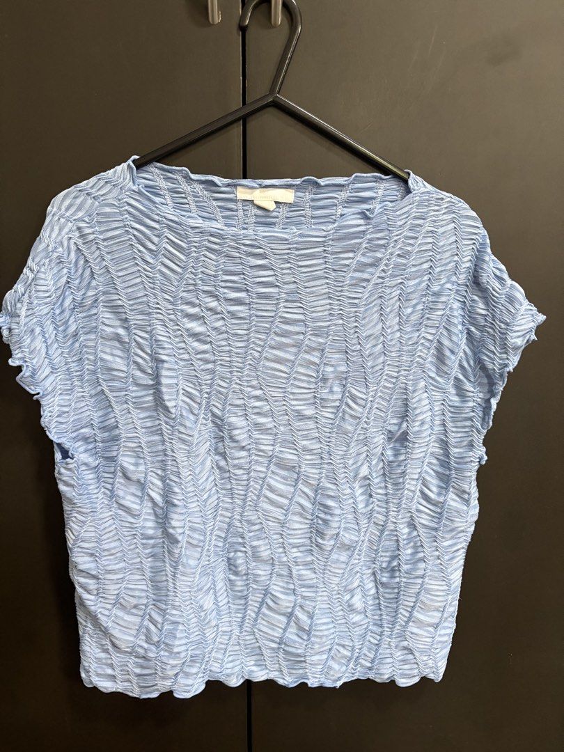 Light Blue Textured Cropped Top (Category: Blouses) located in Las Pinas. Submitted by beissmart (Listing ID 1461186748, Image 1). Description: - Light blue cropped top - Unique textured fabric - Short sleeves - Slightly ruffled hem - Very stretchy material - Versatile for casual or night out looks.