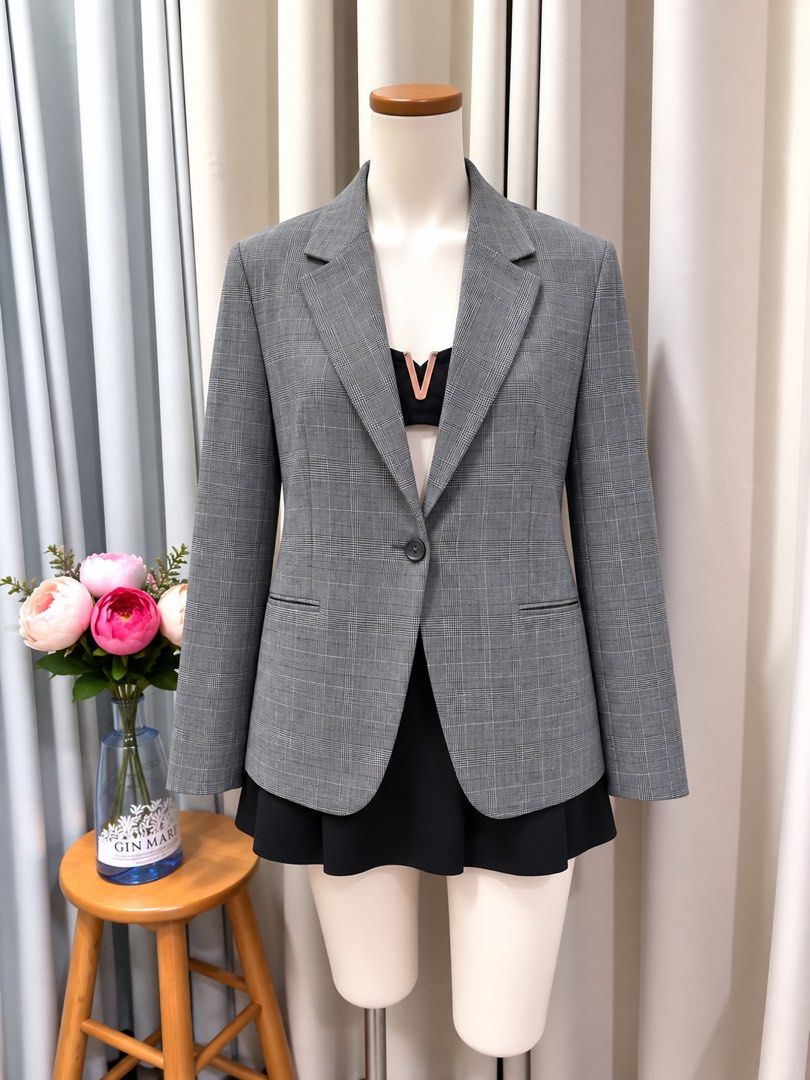 Lightweight Plaid Gray Blazer (Category: Coats, Jackets and Outerwear) located in Taguig. Submitted by vm.co (Listing ID 1461316996, Image 1). Description: Perfect for: • Corporate office wear • Business travel • Smart casual outfits • Rainy or cool weather • Capsule wardrobe • Everyday sophisticated styling Condition: Appears to be in very good preloved condition with no visible major stains, tears, or discoloration in the photo. A light steam w