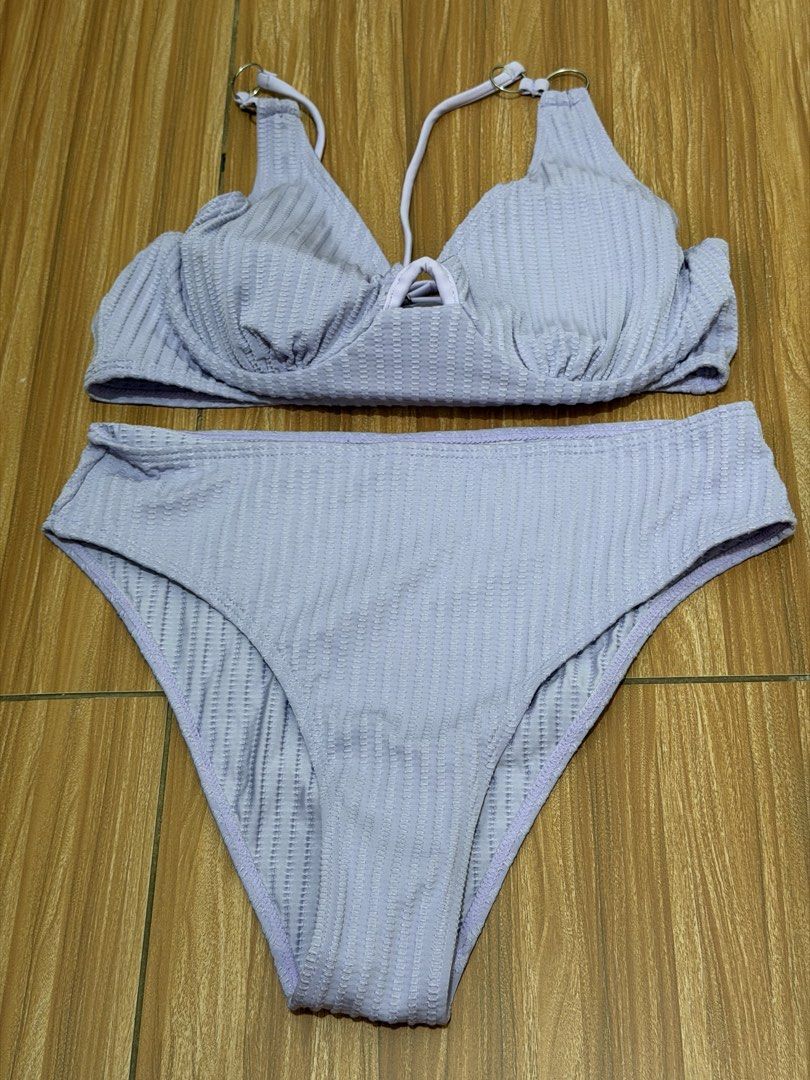 Lilac Textured Bikini Set Size M (Category: Bikinis & Swimsuits) located in San Mateo. Submitted by shane2208 (Listing ID 1461265682, Image 2). Description: NOT USED EVEN ONCE RFS WRONG SIZE - Cute lilac bikini set - Textured fabric all over - Adjustable straps - Cute tie detail at the front of the top - High-waisted bottoms - Size: M - Made in China.