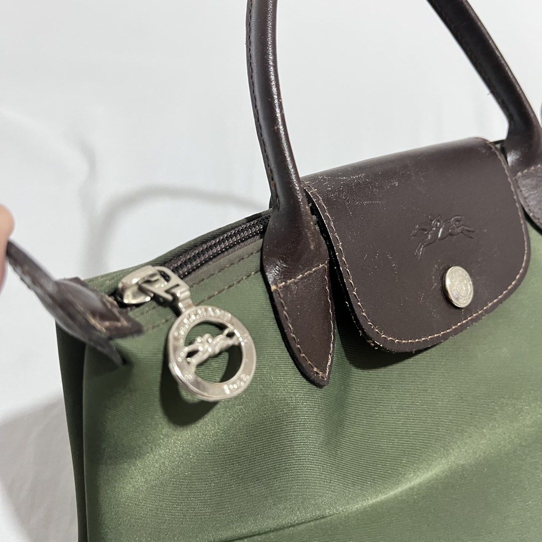 LONGCHAMP SMALL LE PLIAGE (Category: Tote Bags) located in Taguig. Submitted by maniladept. (Listing ID 1461230157, Image 3). Description: LONGCHAMP SMALL LE PLIAGE AUTHENTIC Sign of usage only Still crisp body 9/10 condition Negotiable Item only Dm.