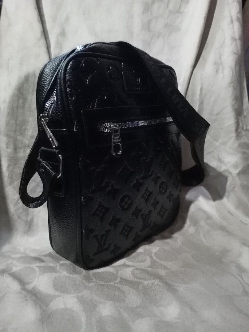 Louis Vuitton Black Monogram Crossbody Bag (Category: Luxury Bags & Wallets) located in Aguinaldo. Submitted by baguioukayukay2600 (Listing ID 1461115756, Image 2). Description: - Louis Vuitton crossbody bag - Iconic all-over monogram pattern - Front zippered pocket - Spacious main compartment - Adjustable strap with 'LOUIS VUITTON' text - Silver-tone hardware with LV branded zipper pull - Ideal for everyday wear.