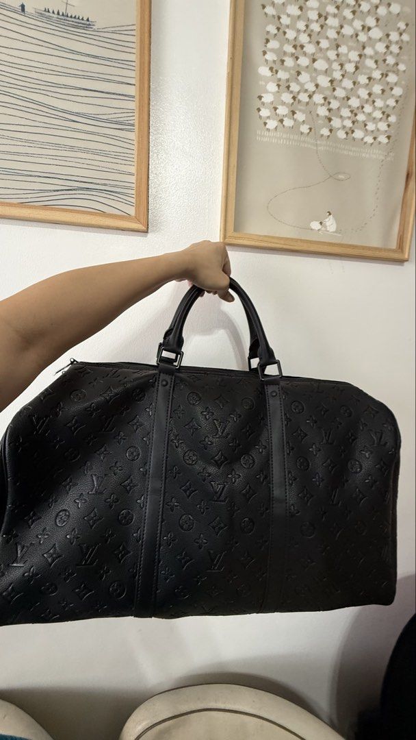 Louis Vuitton Keepall Black Empreinte 55 (Category: Tote Bags) located in Manila. Submitted by prelovedrepubliq (Listing ID 1461309500, Image 2). Description: Used only once. No signs of use. Good as brand new 💯 With dustbag and sling.