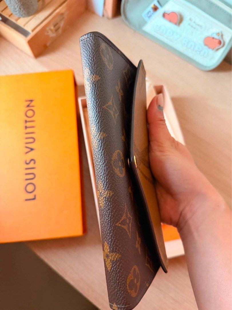 Louis Vuitton Monogram Canvas Wallet (Category: Luxury Bags & Wallets) located in Binan City. Submitted by mlvtg (Listing ID 1461221063, Image 3). Description: - Authentic Louis Vuitton wallet - Classic monogram canvas - Secure snap closure - Interior zippered coin pocket - Multiple card slots and compartments - Comes with original box and dust bag - Perfect for organizing your essentials.